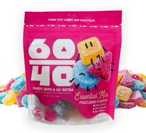 Pink bag of Essential Mix gummy candies with cartoon characters on a white background